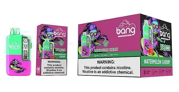 Bright green-and-pink Bang disposable vape with a small digital screen shown beside two matching Watermelon Cherry boxes featuring a purple cartoon mascot, the Bang logo, '32,000 puffs' marking and a prominent nicotine warning label.
