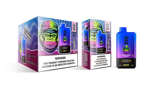 A blue-to-purple gradient disposable vape device shown alongside two matching retail boxes, featuring colorful graphics, '50,000 puffs' text and a prominent nicotine warning label.