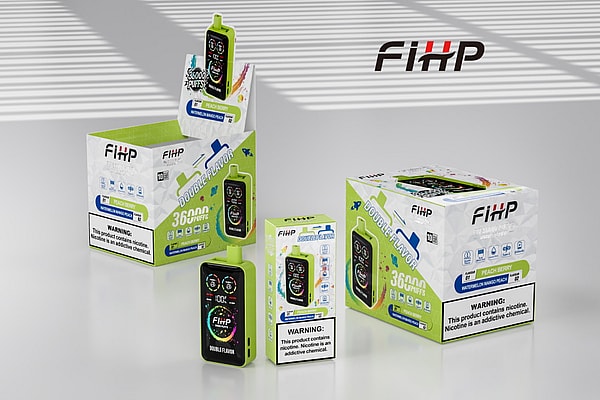 Green and black FIHP disposable vape device standing in front of matching retail boxes and a countertop display labeled 'Double Flavor' and '36000 puffs,' nicotine warning labels visible and the FIHP logo on a striped light background.