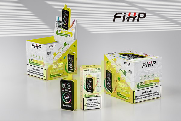 Three FiHP disposable vape products and packaging in yellow-green boxes labeled "Double Flavor 36000 Puffs" and "Lemon Lime", arranged on a light-gray surface with striped window-blind shadows and visible nicotine warning labels.