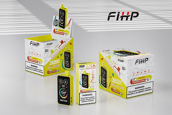 Display of FiHP vaping devices and packaging arranged on a white tabletop with striped shadows, showing yellow-and-black 'Double Flavor' devices labeled 36,000 puffs, peach ice and strawberry banana flavors, and prominent nicotine warning labels.