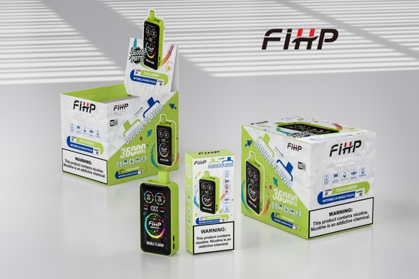 Green and black FIHP disposable vape device standing in front of matching retail boxes and a countertop display labeled 'Double Flavor' and '36000 puffs,' nicotine warning labels visible and the FIHP logo on a striped light background.