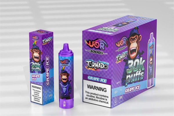 Purple Grape Ice vaping packaging and device—large display box, small box, and cylindrical disposable device—featuring a snarling cartoon chimp, prominent "30k puffs" and "Grape Ice" text and a nicotine warning label, set on a light surface with horizontal shadow stripes.