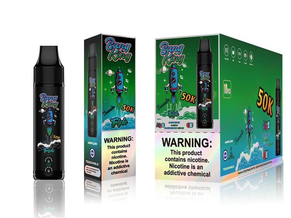 Three views of a Bang Ring vape product on a white background: a black pod-style device with a blue rocket graphic and '50K' branding alongside two matching green retail boxes featuring the same rocket artwork, flavor icons and a prominent nicotine warning label.