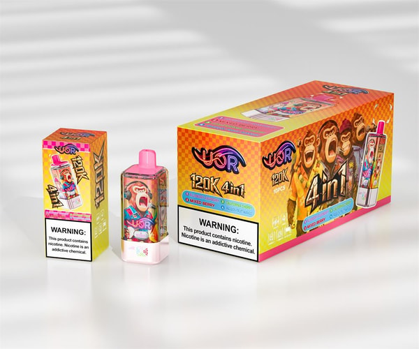 Bright orange-and-pink boxed vape product set with a small pink-capped device and two matching boxes labeled "120K 4in1" featuring cartoon screaming monkeys and a prominent nicotine warning label.