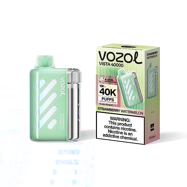 A mint-green VOZOL Vista 40000 disposable vape device with a clear cylindrical cartridge standing beside its matching box labeled "40K puffs" and "Strawberry Watermelon" with a nicotine warning.