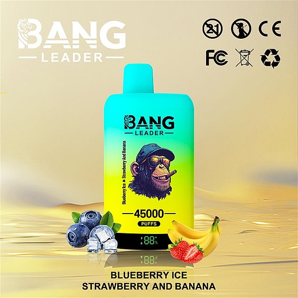 Gradient teal-to-yellow disposable vape device labeled BANG LEADER and 45000 puffs with the flavor text Blueberry Ice Strawberry and Banana, blueberries with ice cubes, a banana and a strawberry arranged in front, and certification icons at the top right on a reflective golden surface.