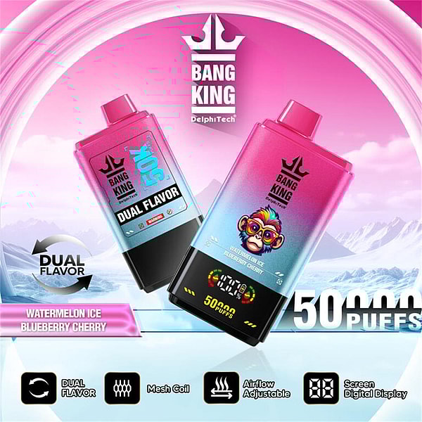Two pink-to-blue gradient Bang King disposable vape devices angled against a stylized icy pink mountain background, featuring a colorful monkey logo, 'Dual Flavor' label (Watermelon Ice / Blueberry Cherry), '50,000 puffs' text and icons for mesh coil, adjustable airflow and digital screen.