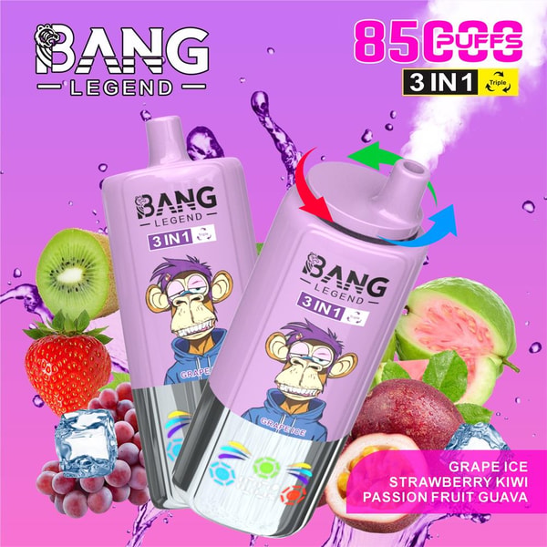 Two lavender 'BANG LEGEND 3IN1' disposable vapes with a cartoon monkey logo, one emitting vapor and circled by colored arrows, set against a purple splash background with strawberries, kiwi, grapes, guava and ice cubes and text advertising 8500 puffs and flavors 'grape ice, strawberry kiwi, passion fruit guava'.