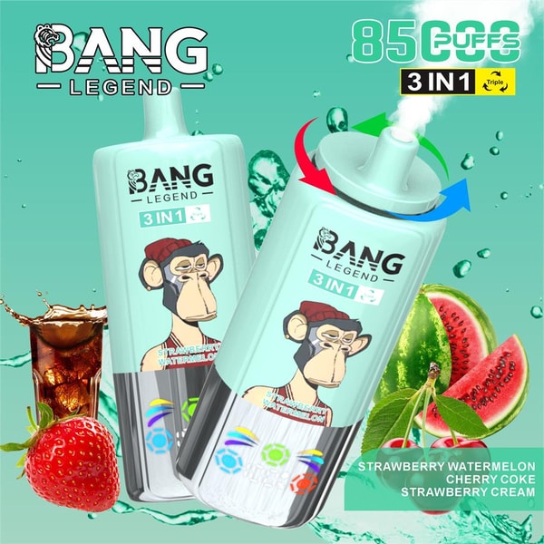 Two mint-green Bang Legend 3-in-1 disposable vape devices with a cartoon monkey logo—one tilted with vapor and colored arrows around the mouthpiece—set against a teal background with water droplets and splashes, surrounded by strawberry, watermelon slices, cherries and a glass of cola, with on-package text indicating 8500 puffs and flavors Strawberry Watermelon, Cherry Coke and Strawberry Cream.