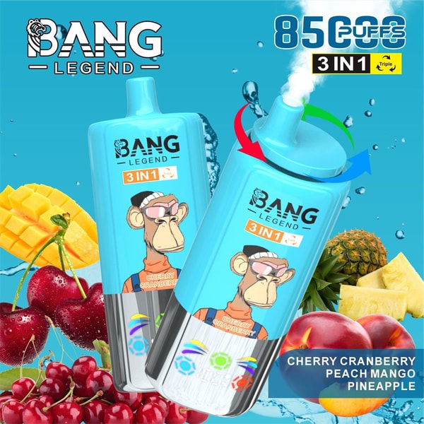 Two bright turquoise Bang Legend disposable vape devices with a cartoon monkey logo emitting vapor, surrounded by cherries, cranberries, peaches, mango and pineapple and labeled “3 IN 1” and “8500 puffs”