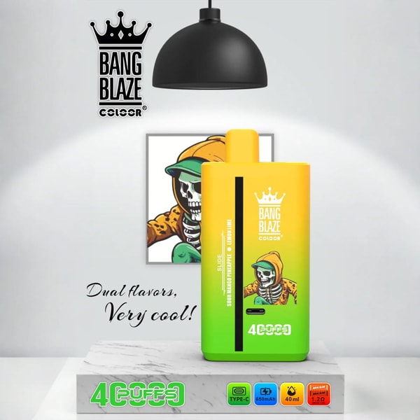 Yellow-to-green Bang Blaze disposable vape device with a crown logo and skull-in-hoodie artwork standing on a marble pedestal under a black hanging lamp, a framed skull print and the phrase "Dual flavors, Very cool!" visible behind, with a 4000-puffs badge at the base.