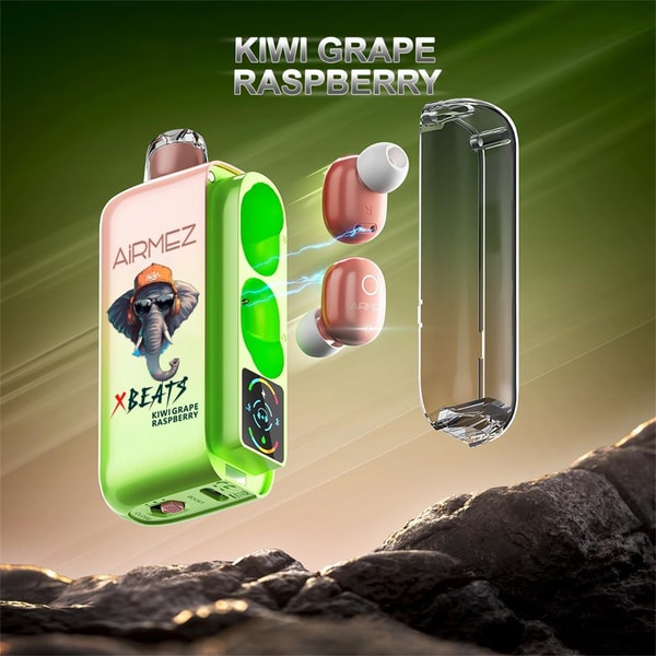 Floating product shot of a lime-green Airmez XBeats wireless earbud charging case with a clear detachable cover and two pink earbuds shown mid-air, featuring an elephant logo and the text "Kiwi Grape Raspberry" on a green gradient background above rocky foreground.