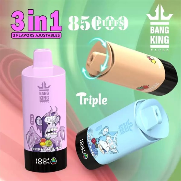 Three colorful cylindrical disposable vape devices—a purple one with an angry cartoon ape, a peach one with fruit artwork, and a light blue one with a cartoon wolf—each with black digital bases and top mouthpieces, arranged on a green-pink swirled background with prominent text reading '3 in1', 'Triple', and the Bang King logo.