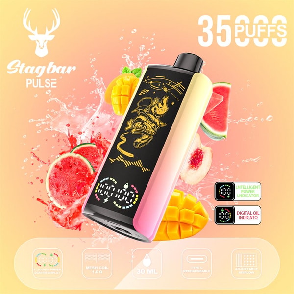 Stagbar Pulse vape device with a gradient yellow-pink casing and black digital front panel featuring a gold graphic, shown tilted among splashing juice and sliced mango, watermelon and peach, with large “35 PUFFS” text and small icons advertising 30 mL capacity, mesh coil, Type‑C rechargeability and adjustable airflow.