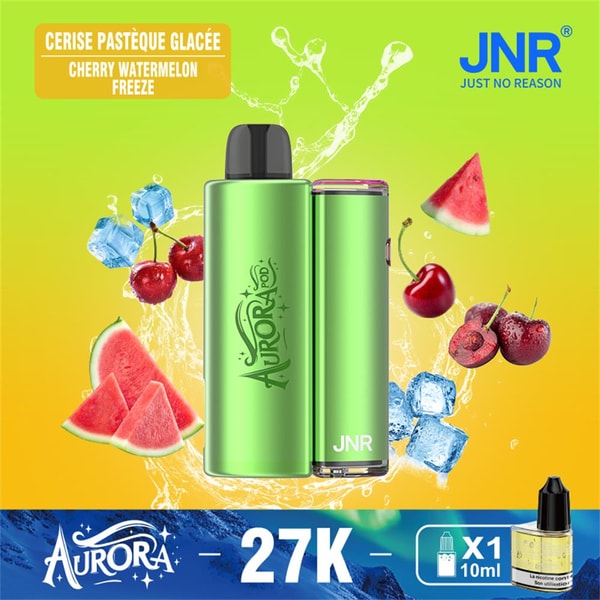 Green Aurora JNR vaping device centered against a yellow-green background, surrounded by watermelon slices, cherries and ice cubes with splash effects, a 'Cherry Watermelon Freeze' flavor label and a '27K' price banner.