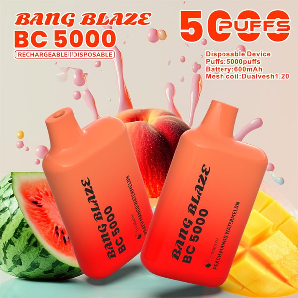 Two orange Bang Blaze BC 5000 disposable vape devices set before sliced watermelon and mango with splashing juice droplets, large “5000 puffs” text and small product specs visible.