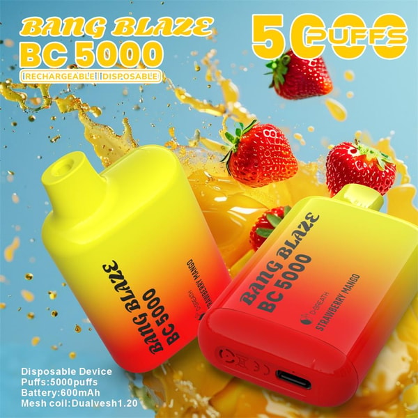 Two yellow-to-red gradient Bang Blaze BC5000 disposable vape devices, one upright and one lying to show a USB charging port, floating amid splashing mango-colored liquid and strawberries with bold '5000 puffs' and brand text in the background.