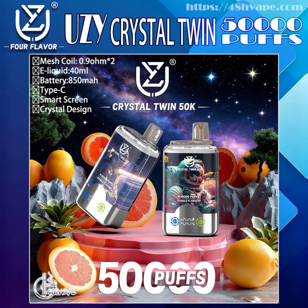 Promotional graphic for the UZY Crystal Twin 50K showing two crystal-design vape devices on a pink pedestal against a starry galaxy background surrounded by grapefruit and oranges, with a feature list (0.9Ω mesh coils, 40ml e-liquid, 850mAh battery, Type‑C, smart screen) and large '50000 PUFFS' text.