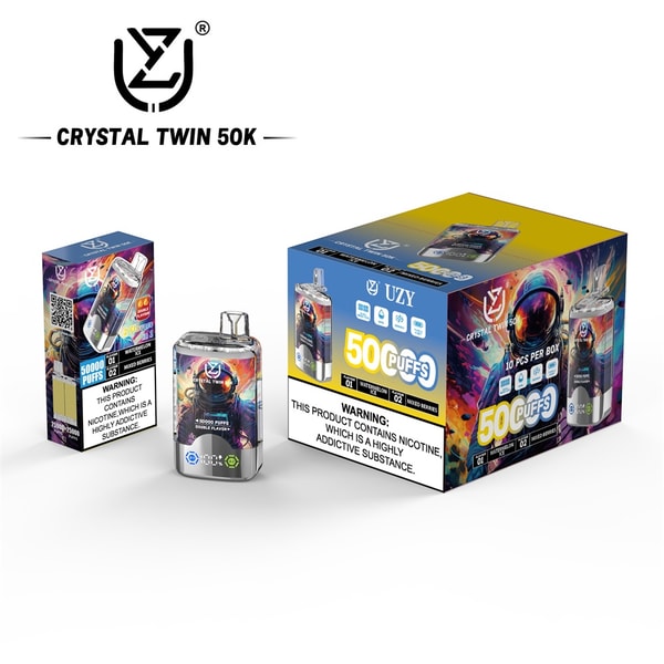 Three colorful UZY Crystal Twin 50K disposable vape items: a small retail sleeve on the left, a chrome-finished pod device in the center, and a larger display box on the right, all with vibrant cosmic/astronaut artwork, prominent 50K/50,000 puffs branding and a visible nicotine addiction warning.
