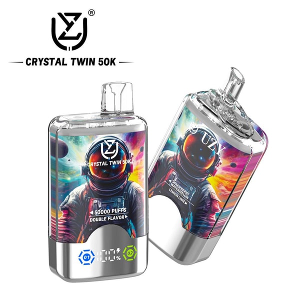Two clear rectangular Crystal Twin 50K disposable vape devices with colorful astronaut space artwork, top mouthpieces and metallic bases showing digital icons and labeling including "50,000 puffs" and "double flavor".