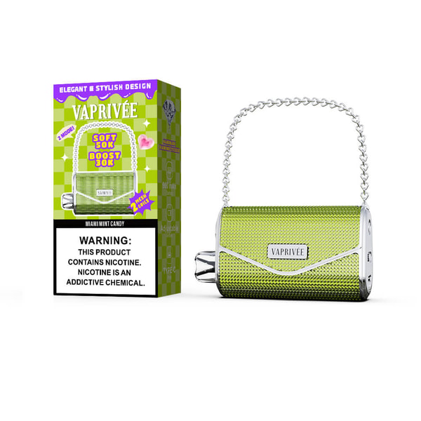 Green textured metallic Vaprivée vape styled like a small handbag with a silver chain handle sits next to matching green checkered packaging that displays the brand name and a prominent nicotine warning label.