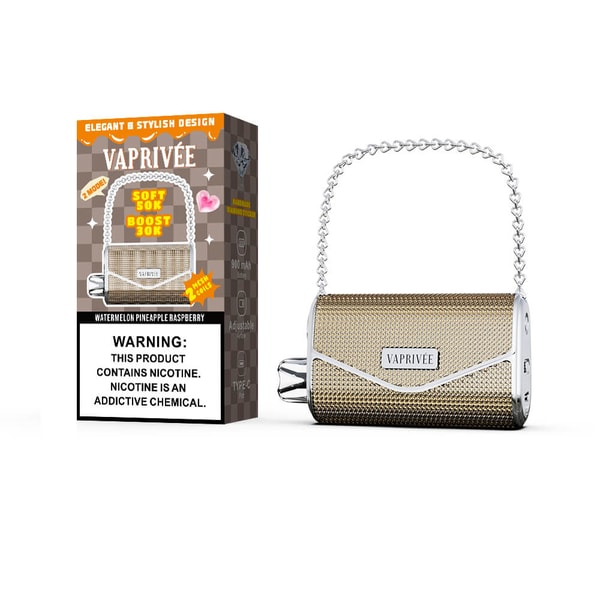 Handbag-shaped gold mesh VAPRIVÉE vape device with a silver chain handle sits beside its branded box showing flavor names (watermelon, pineapple, raspberry) and a nicotine warning label.