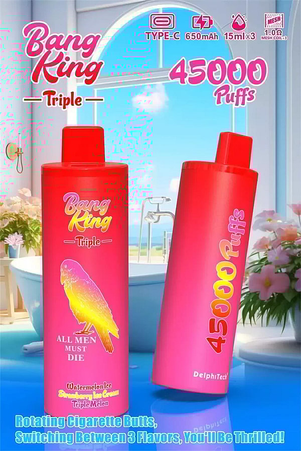 Deux grands appareils de vapotage jetables rose-rouge étiquetés " Bang King Triple " et " 45000 Puffs ", l'un décoré d'un oiseau jaune et du slogan " All Men Must Die ", exposés dans une salle de bains lumineuse près d'une fenêtre avec vue sur la mer et des fleurs.